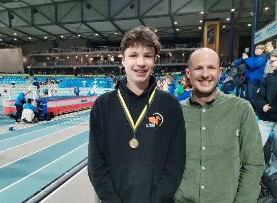 Rune De Bouw met zijn gouden medaille