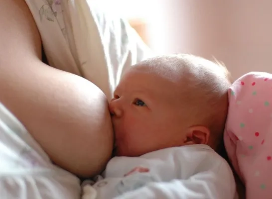 1024px-breastfeeding_a_baby.jpg