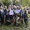 Leden van de jeugdbewegingen ruimen zwerfvuil in en rond de Molenbeek